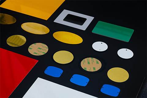 Assorted shapes laser cut from different materials